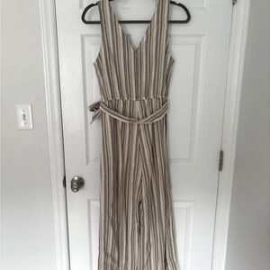 Cream and neutral colored Lulu’s romper Small